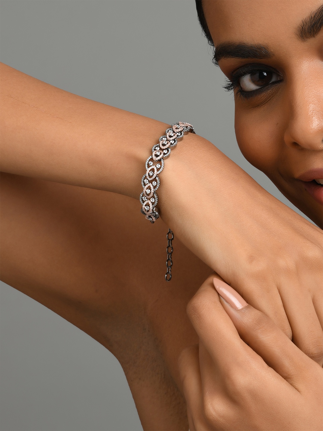 

Fida Gunmetal-Rose Gold Plated American Diamond Bracelet