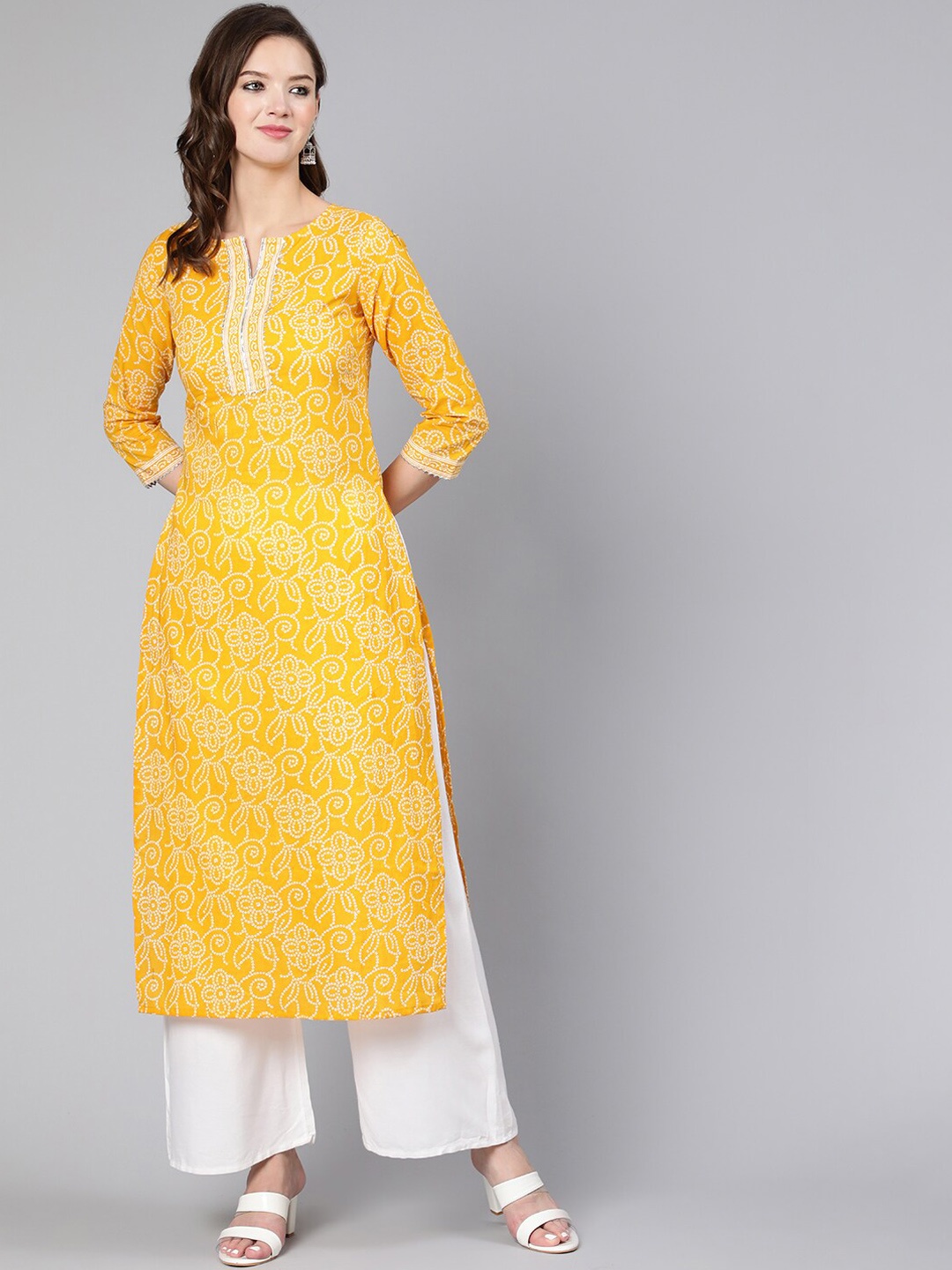 

Nayo Women Yellow & sunglow Ethnic Motifs Printed Keyhole Neck Kurta