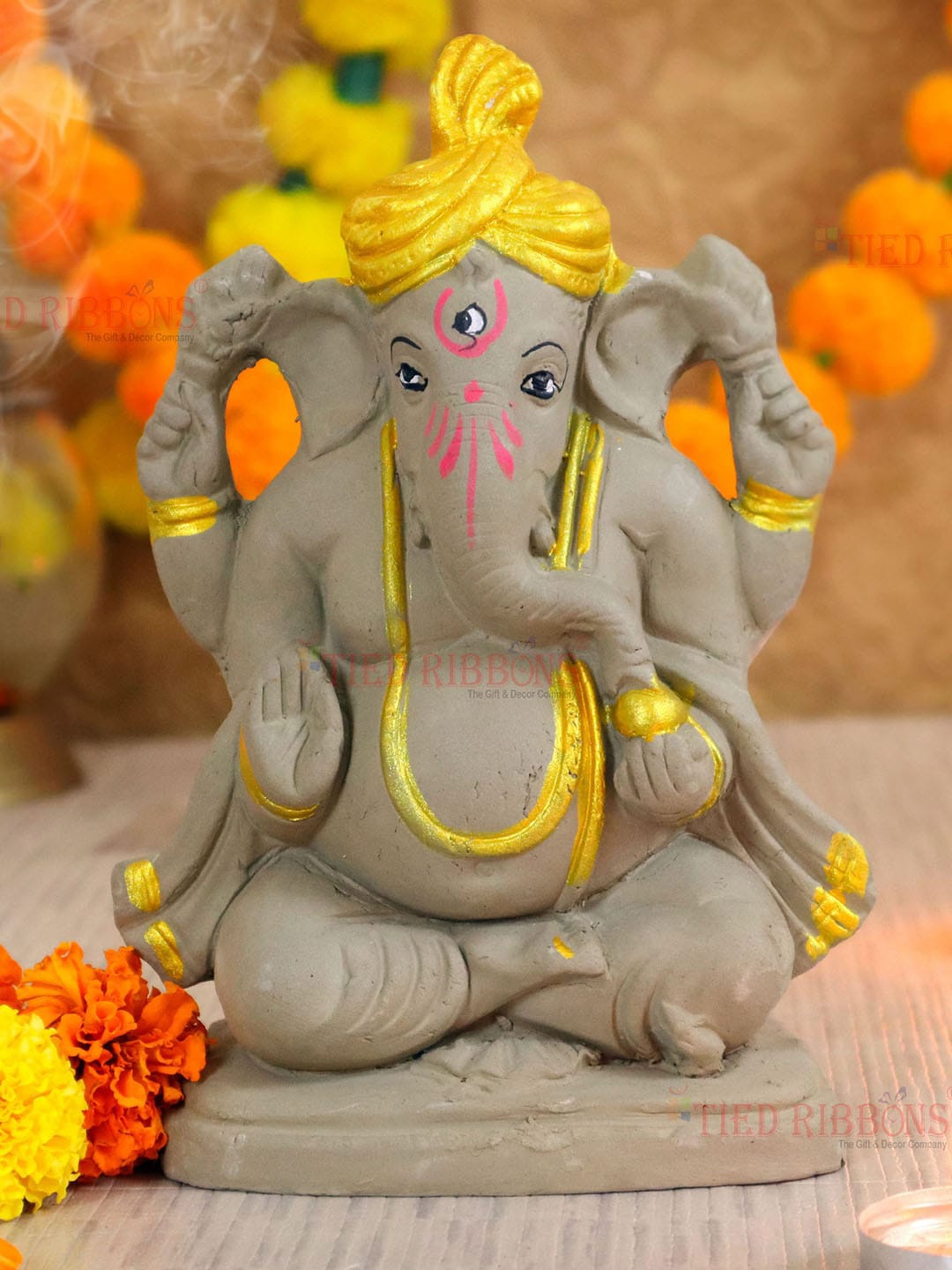

TIED RIBBONS Multi-Colored Ganesha Idol Showpieces