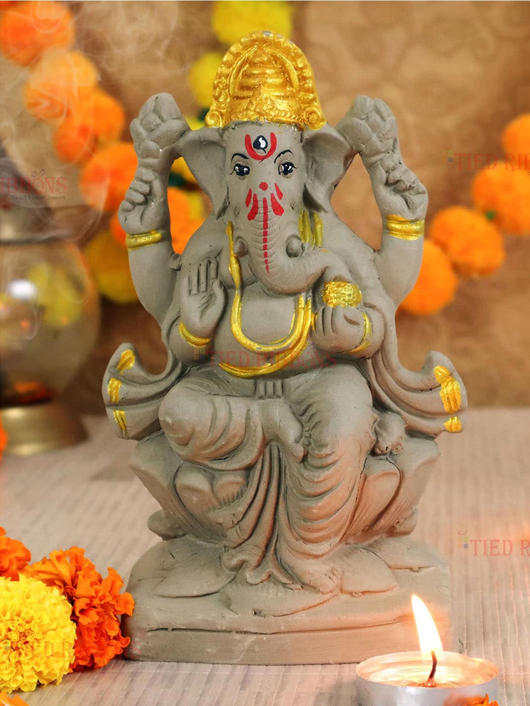 

TIED RIBBONS Gold-Toned Lord Ganesha Idol Showpieces