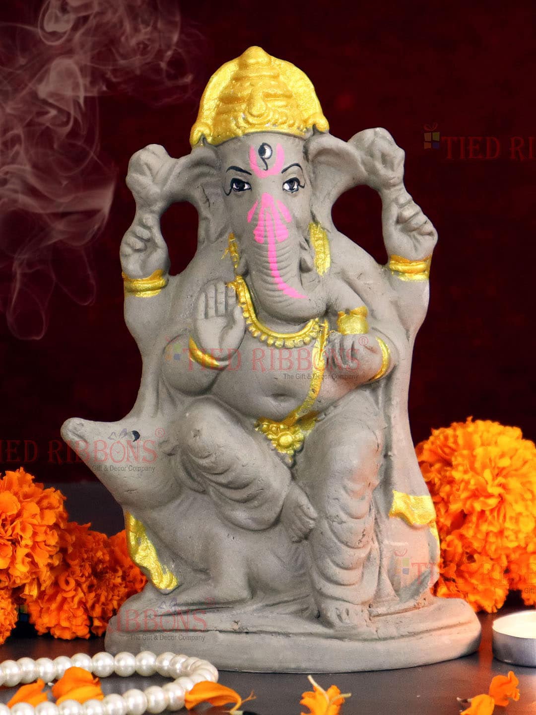 

TIED RIBBONS Brown & Gold-Tined Lord Ganesha Showpieces