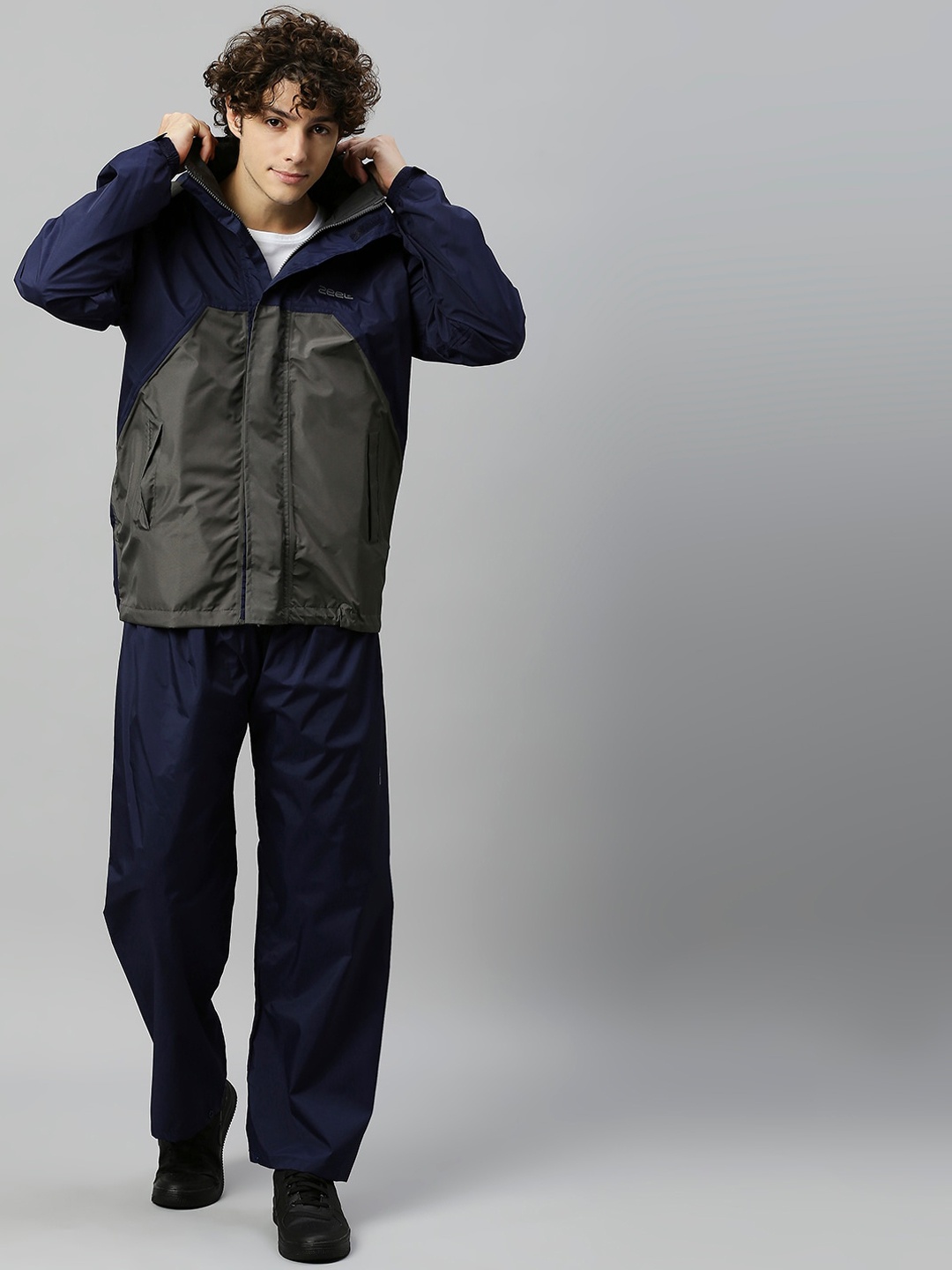 

Zeel Men Blue Solid Rain Suit