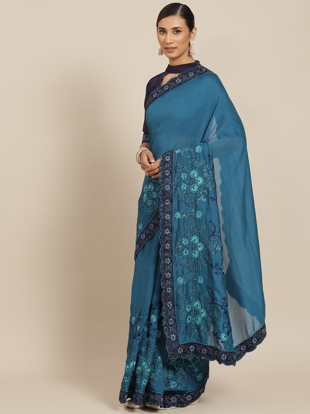 

Kalista Teal Floral Embroidered Saree