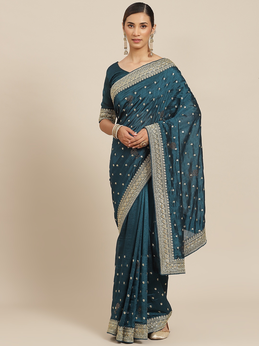 

Kalista Teal & Gold-Toned Ethnic Motifs Zari Saree
