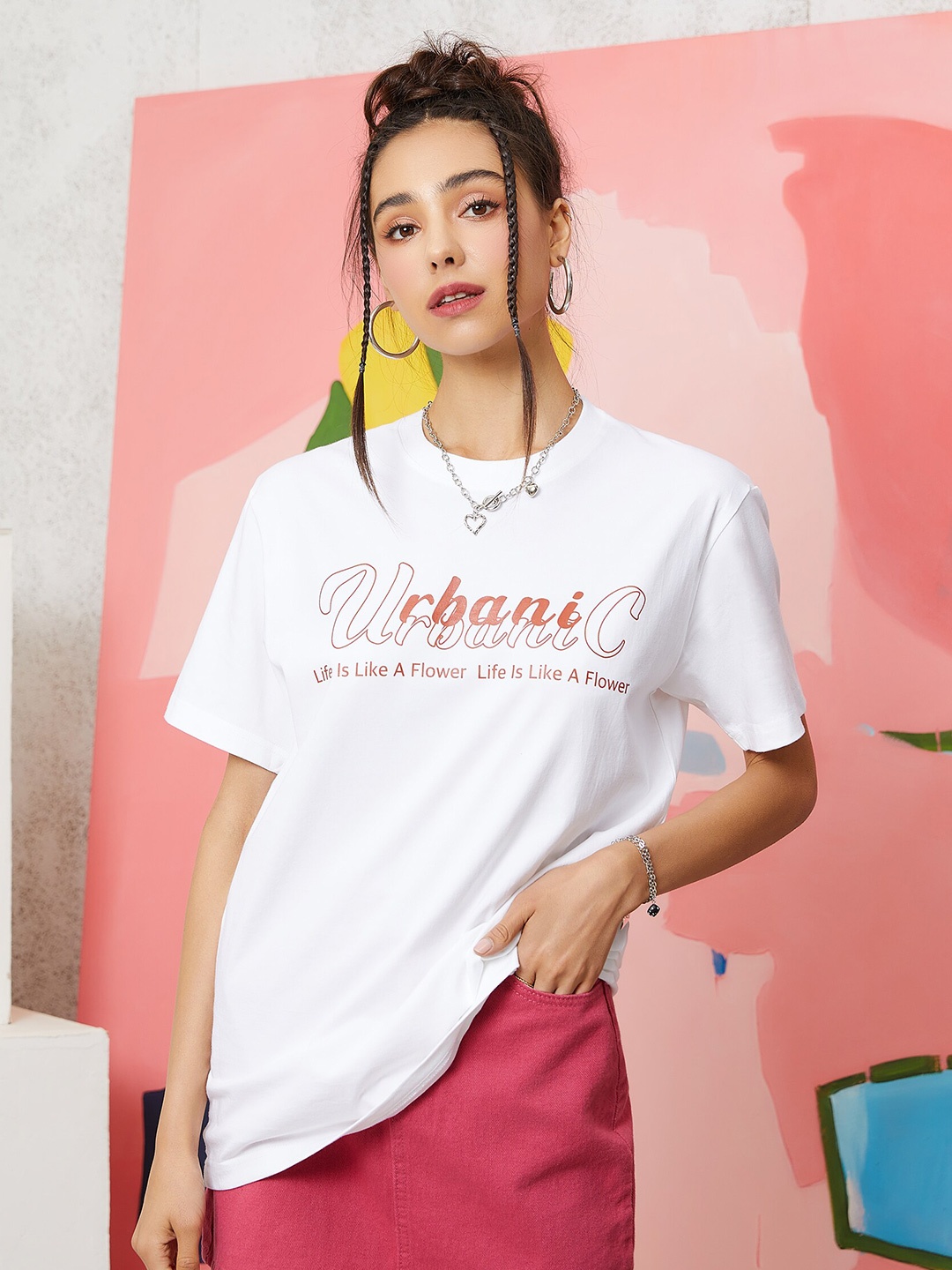 

URBANIC Women Orange & magnolia Typography Printed T-shirt