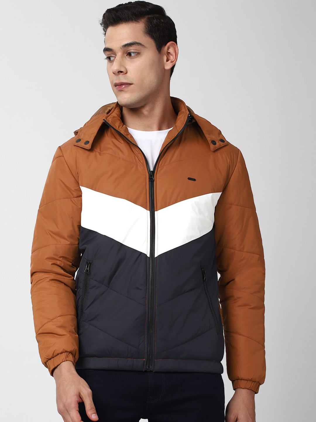 

Peter England Casuals Men Brown Colourblocked Longline Open Front Jacket