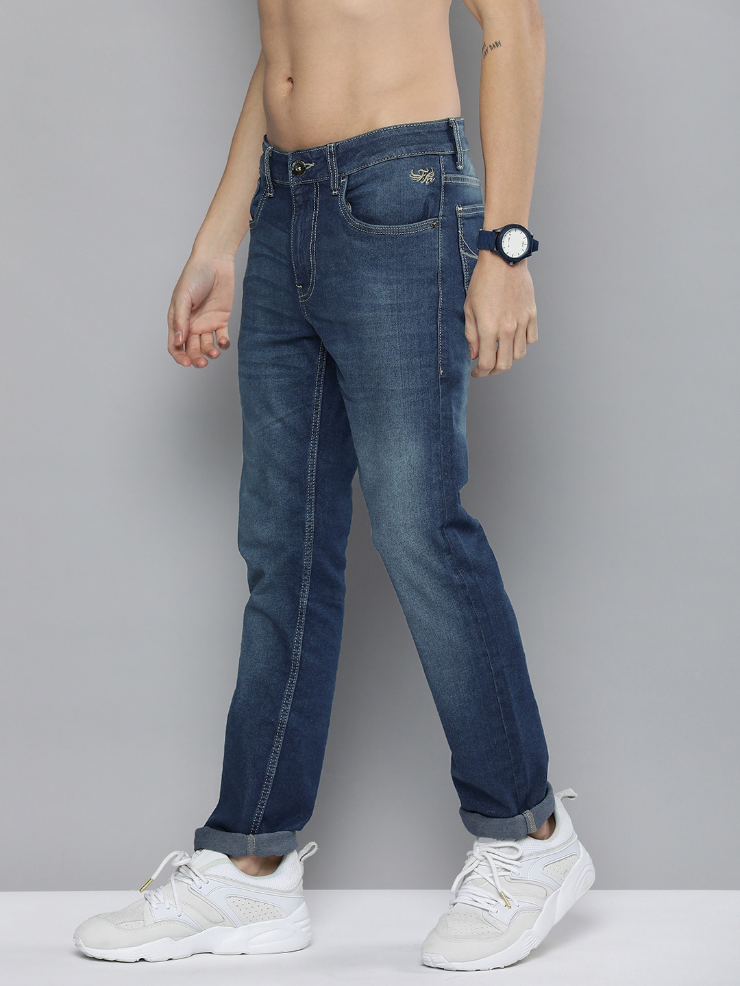 

Flying Machine Men Blue Micheal Slim Tapered Fit Light Fade Stretchable Jeans