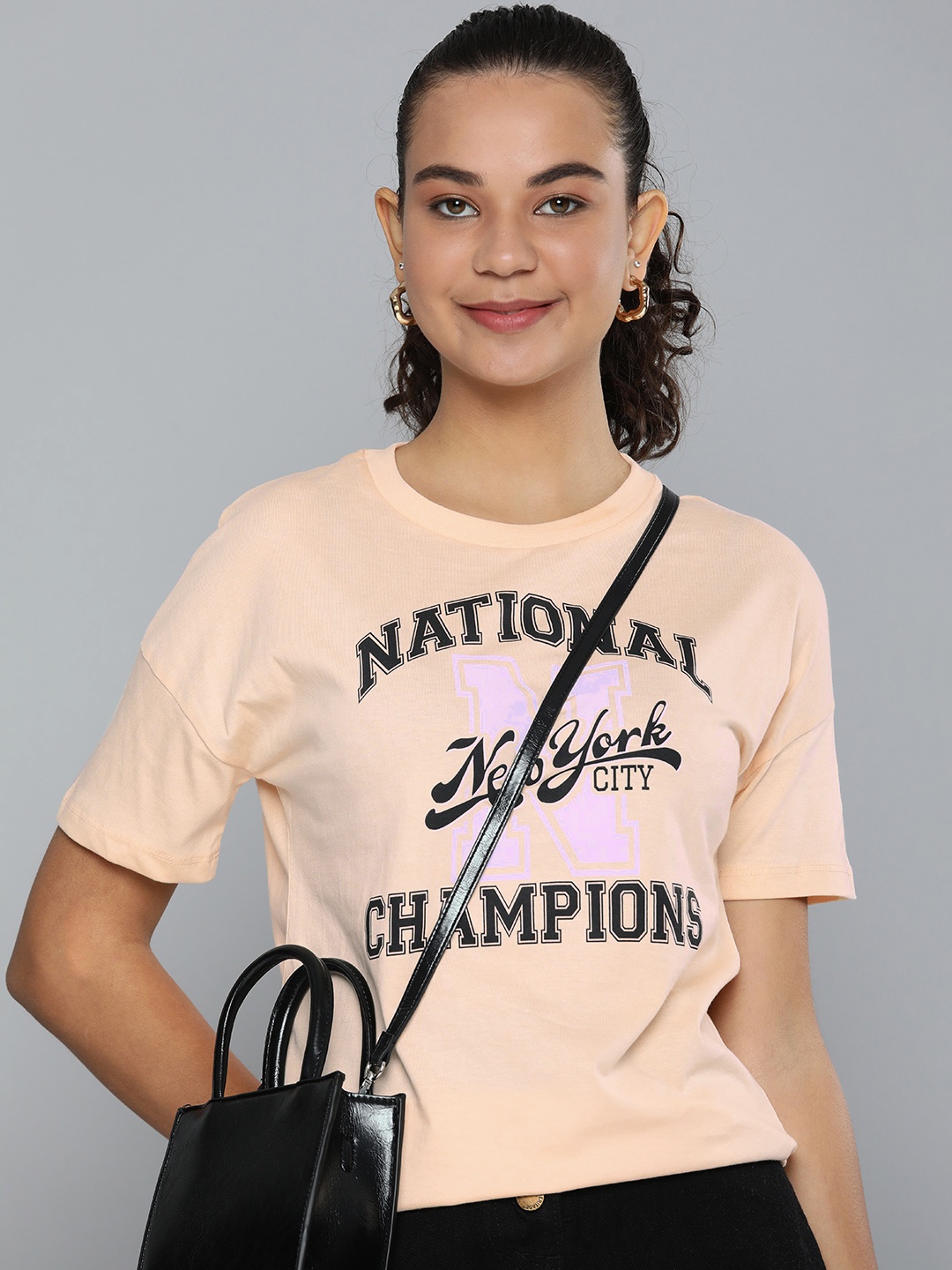 

HERE&NOW Women Peach-Coloured & Black Typography Printed Slim Fit Pure Cotton T-shirt