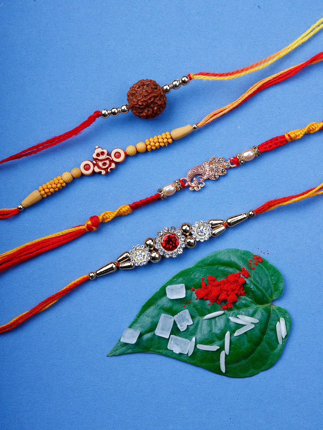 

Ariana Men Set Of 4 Red & Gold-Coloured Beaded Rakhi With Rolichawal