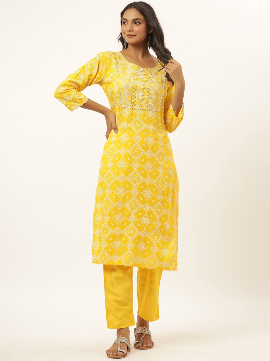 

Yufta Women Mustard Yellow Ethnic Motifs Printed Aari Work Kurti with Trousers