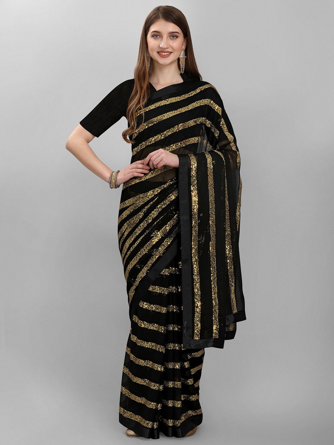 

nirja Fab Black & Gold-Toned Embellished Sequinned Leheriya Saree