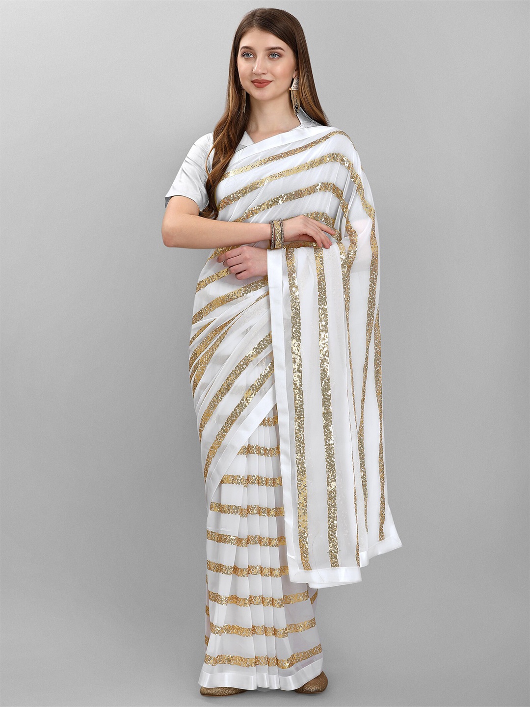 

nirja Fab White & Gold-Toned Embellished Sequinned Leheriya Saree