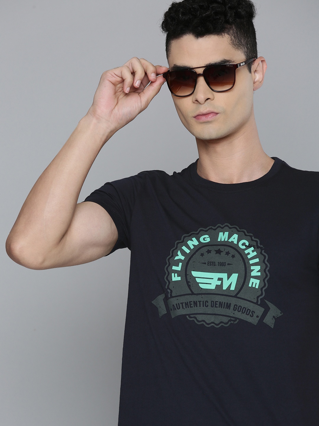 

Flying Machine Men Navy Blue Brand Logo Print Round Neck Knitted Slim Fit T-shirt