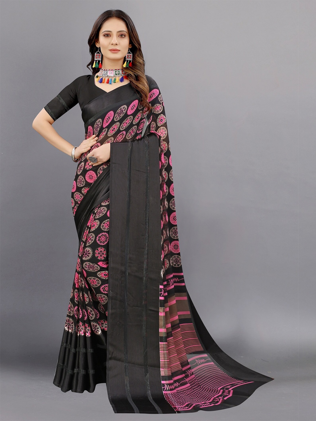 

APNISHA Black & Pink Zari Pure Georgette Saree
