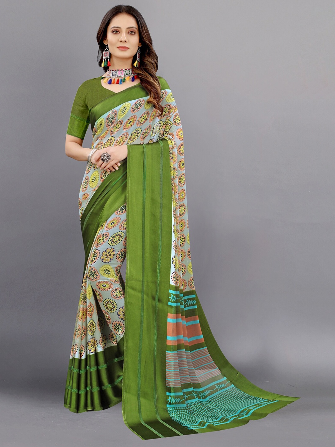 

APNISHA Green & Yellow Floral Zari Pure Georgette Saree