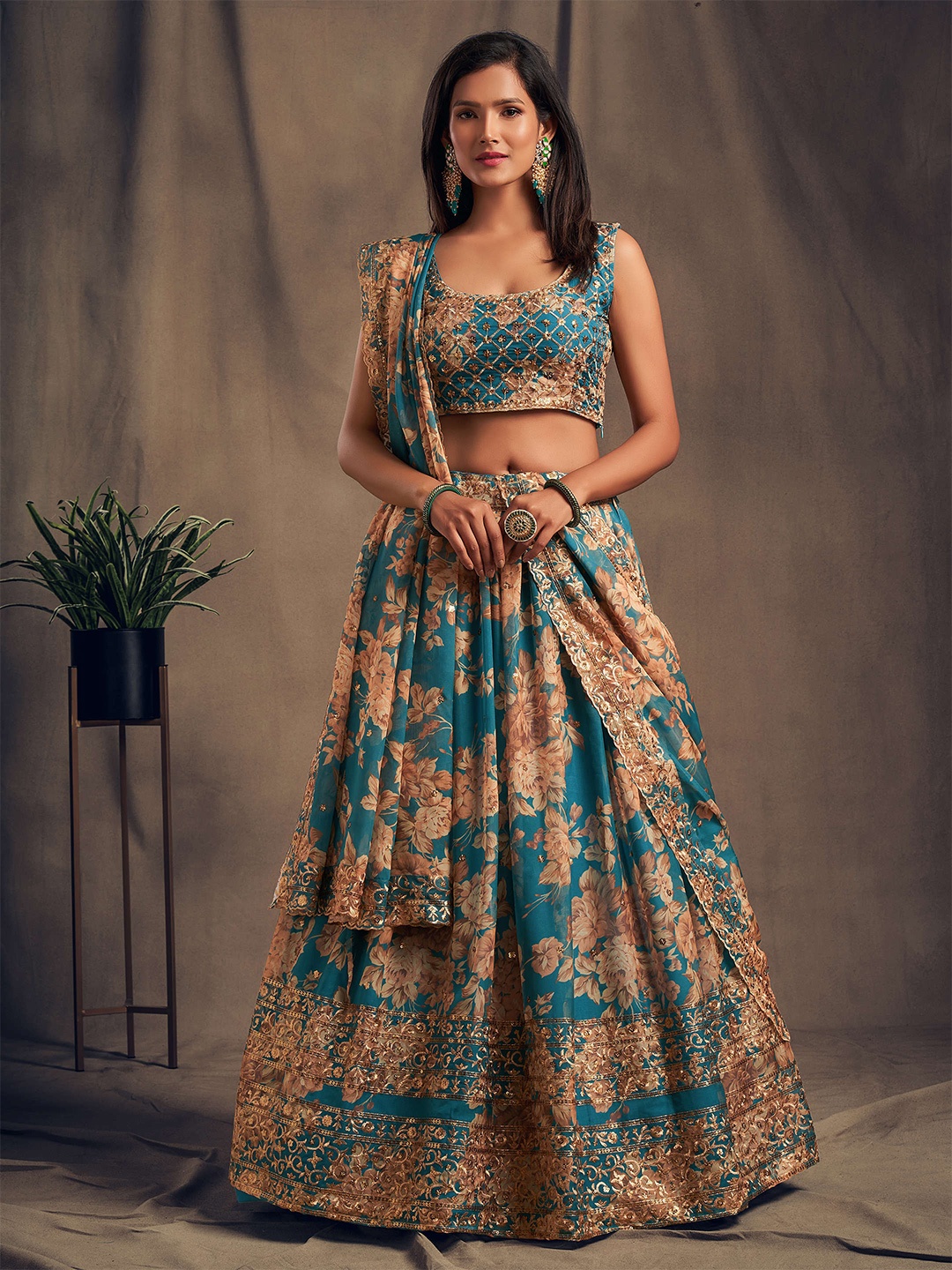 

FABPIXEL Teal & Gold-Toned Embroidered Sequinned Shibori Semi-Stitched Lehenga & Unstitched Blouse With