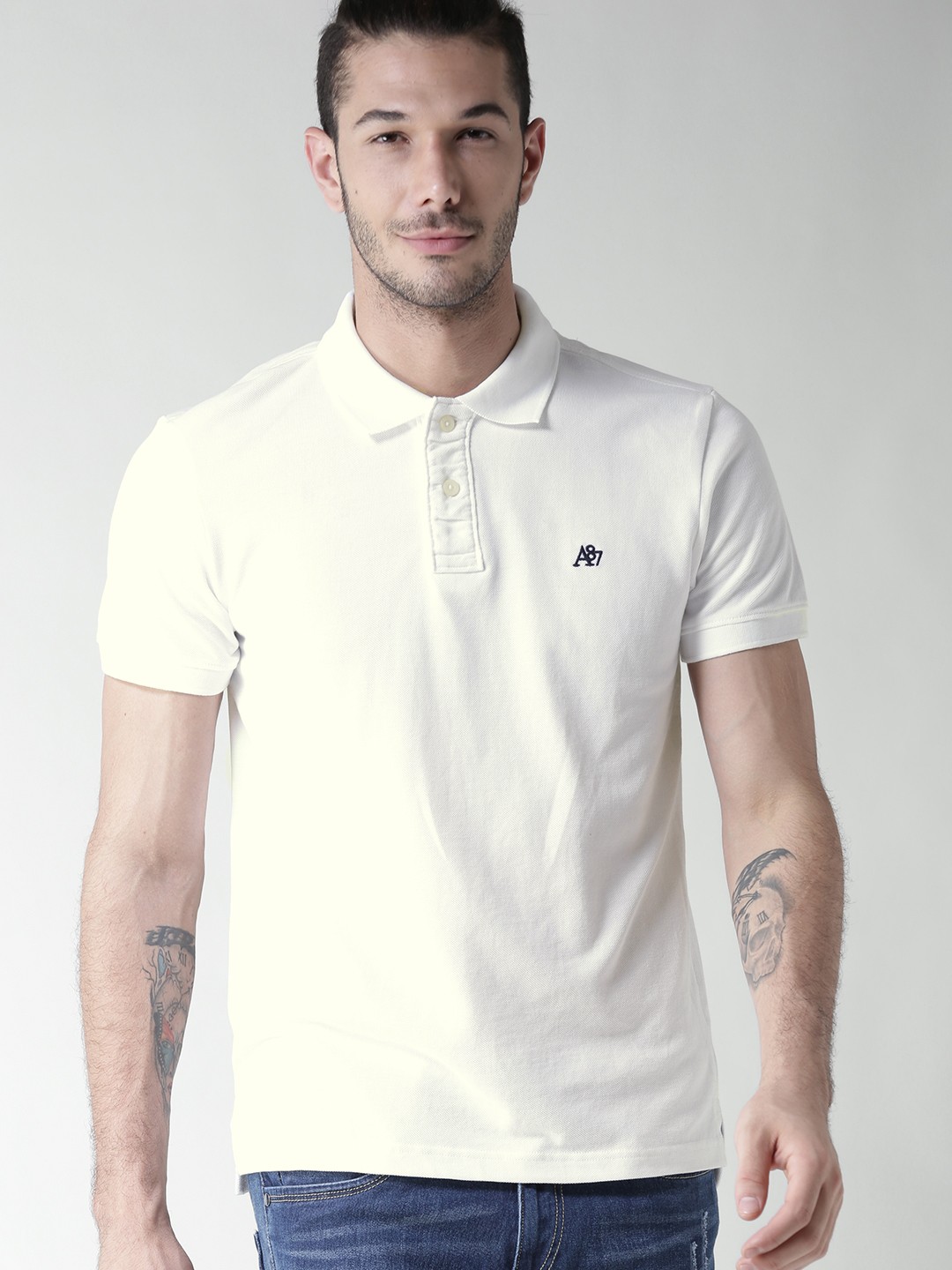 

Aeropostale Men White Solid Polo Collar T-shirt