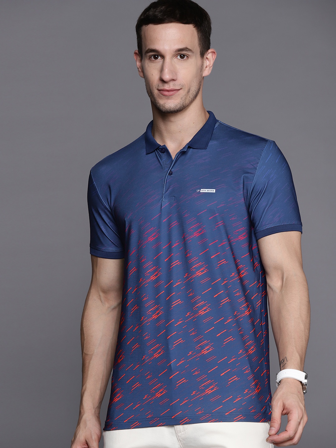 

Louis Philippe Ath Work Men Navy Blue & Pink Striped Polo Collar Slim Fit T-shirt