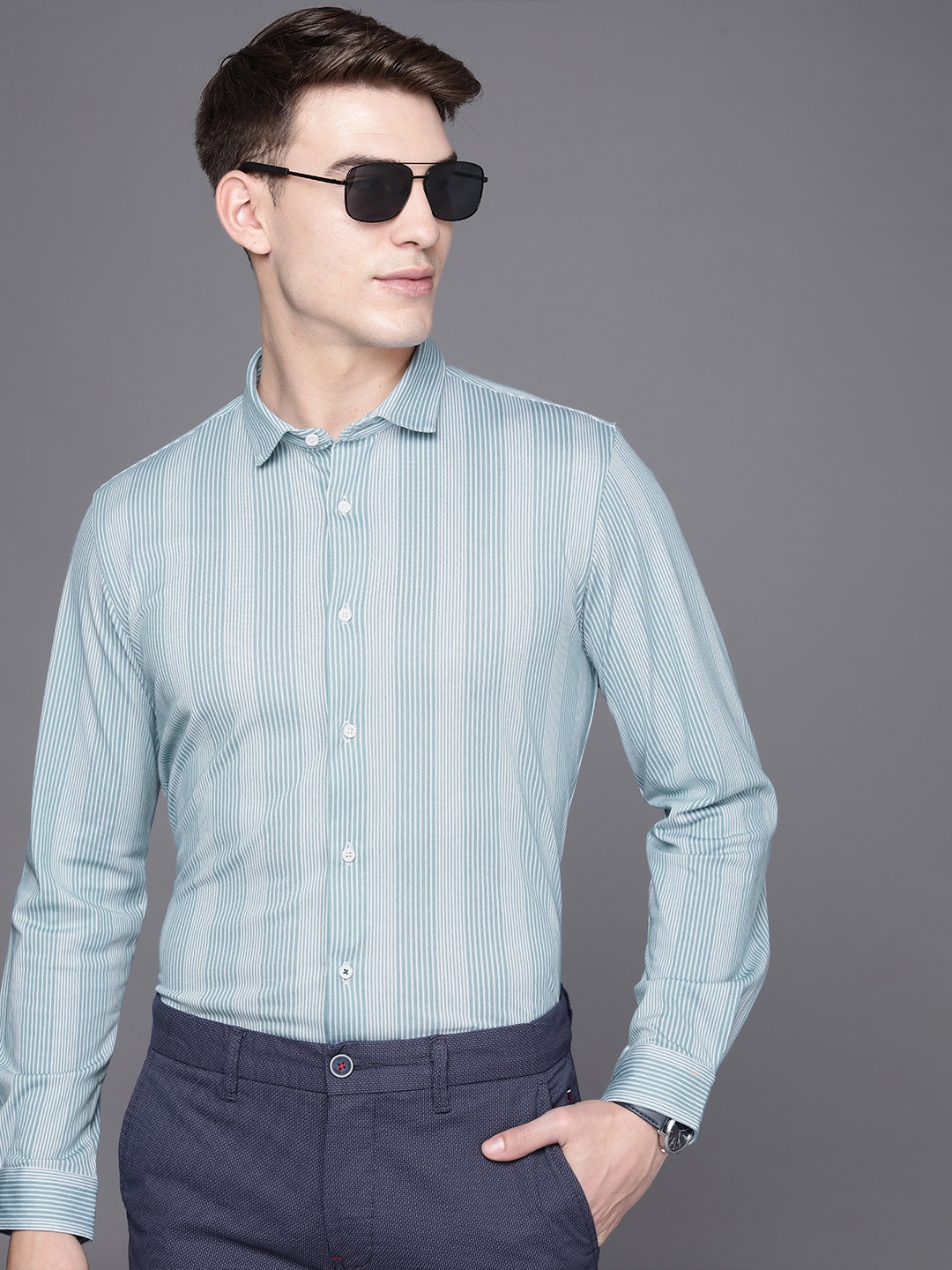 

Louis Philippe Ath Work Men Blue And White Super Slim Fit Striped Semiformal Shirt