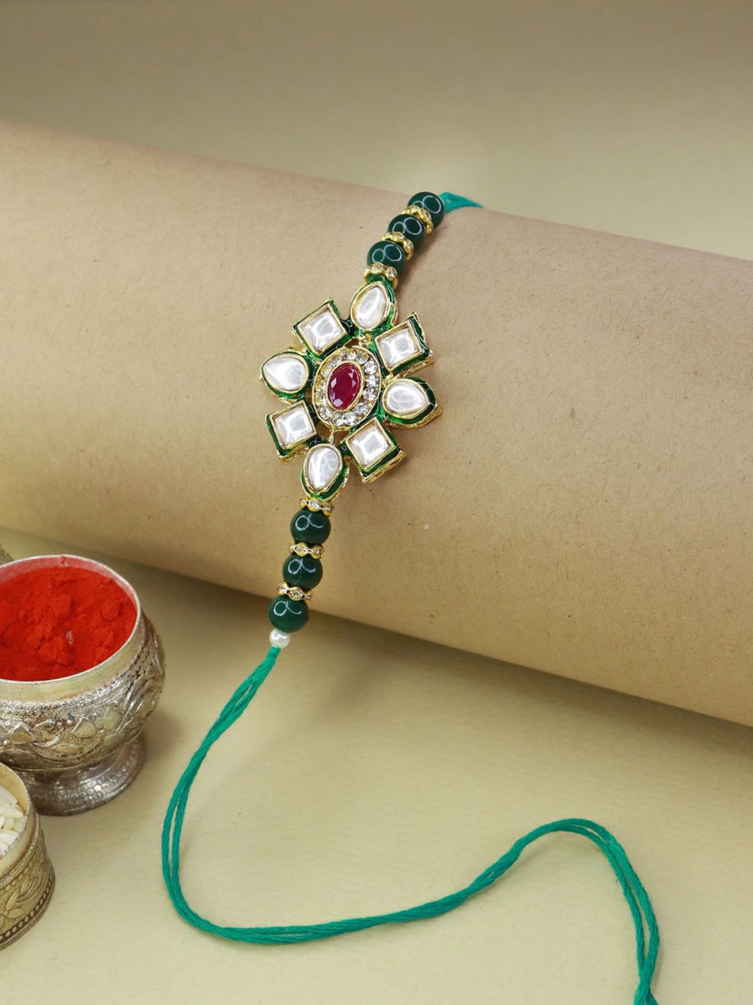 

I Jewels Gold-Toned & Green Floral Kundan Studded Rakhi