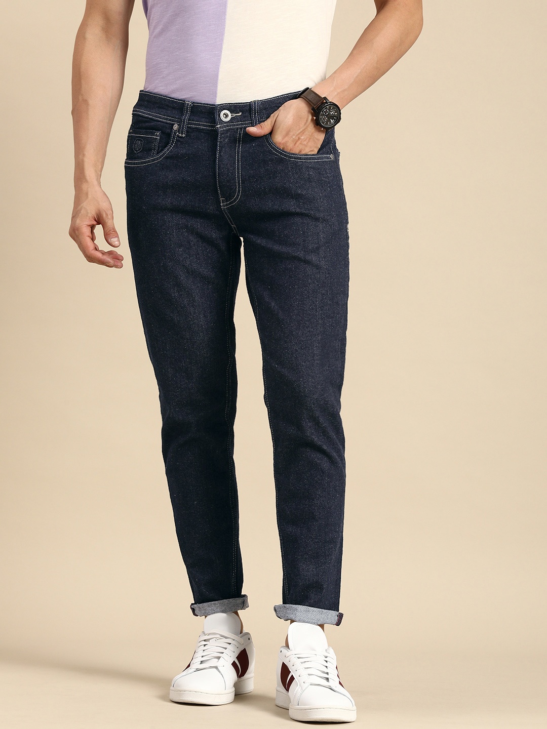

Being Human Men Navy Blue Tapered Fit Mid-Rise Clean Look Stretchable Jeans