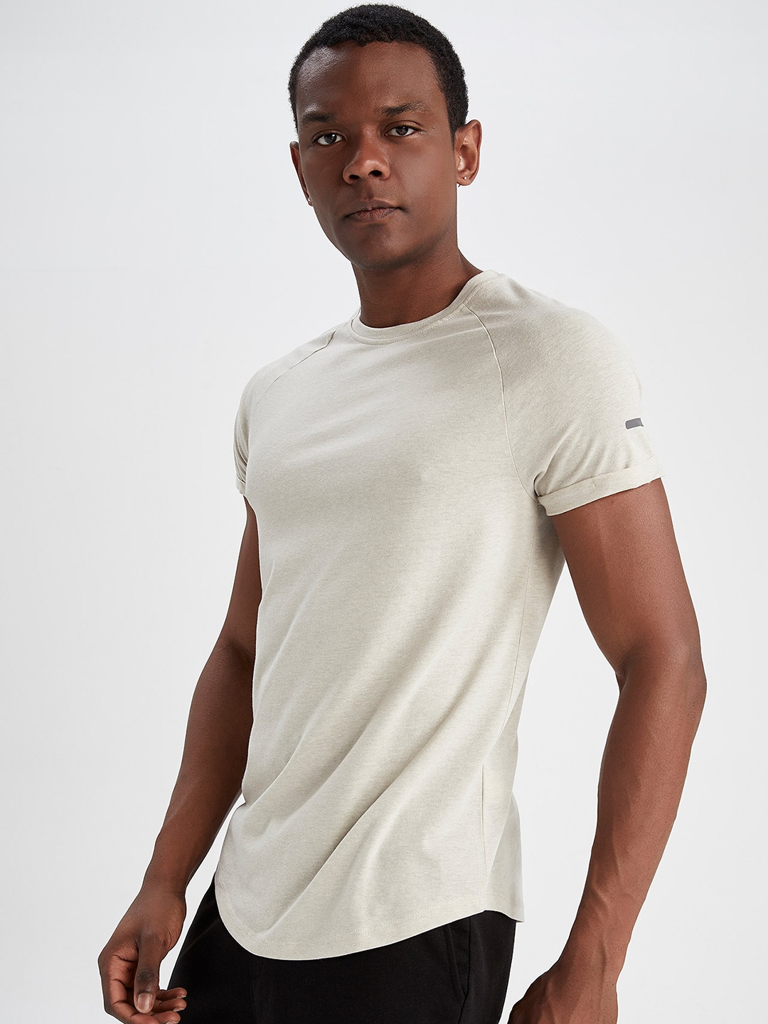 

DeFacto Men Beige Solid T-shirt