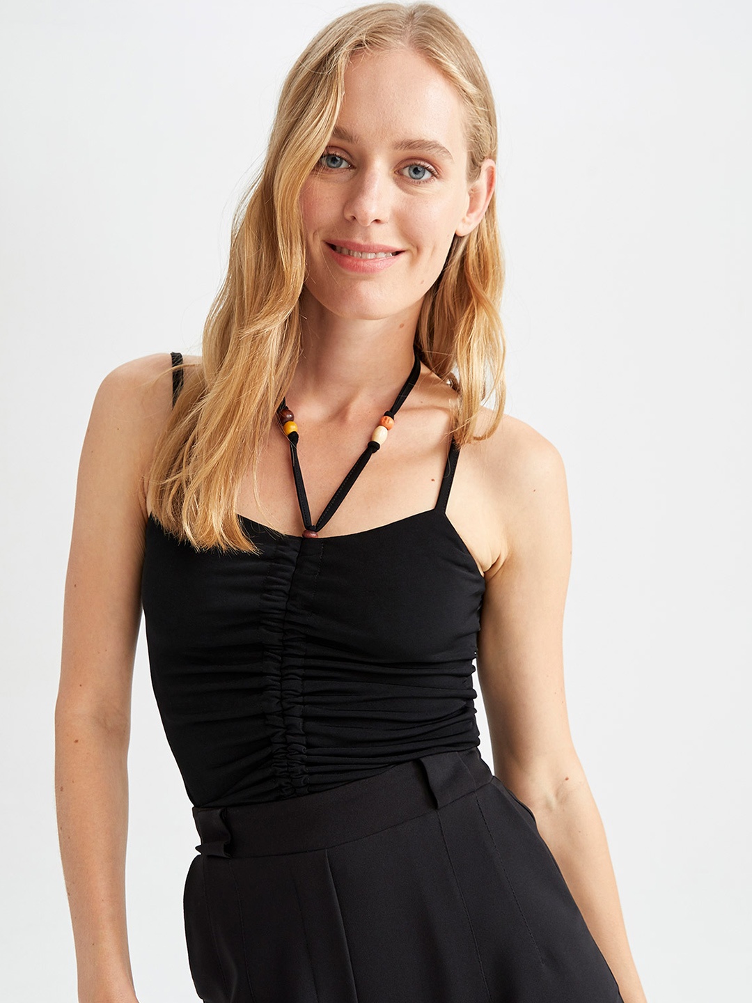 

DeFacto Women Black Solid Top