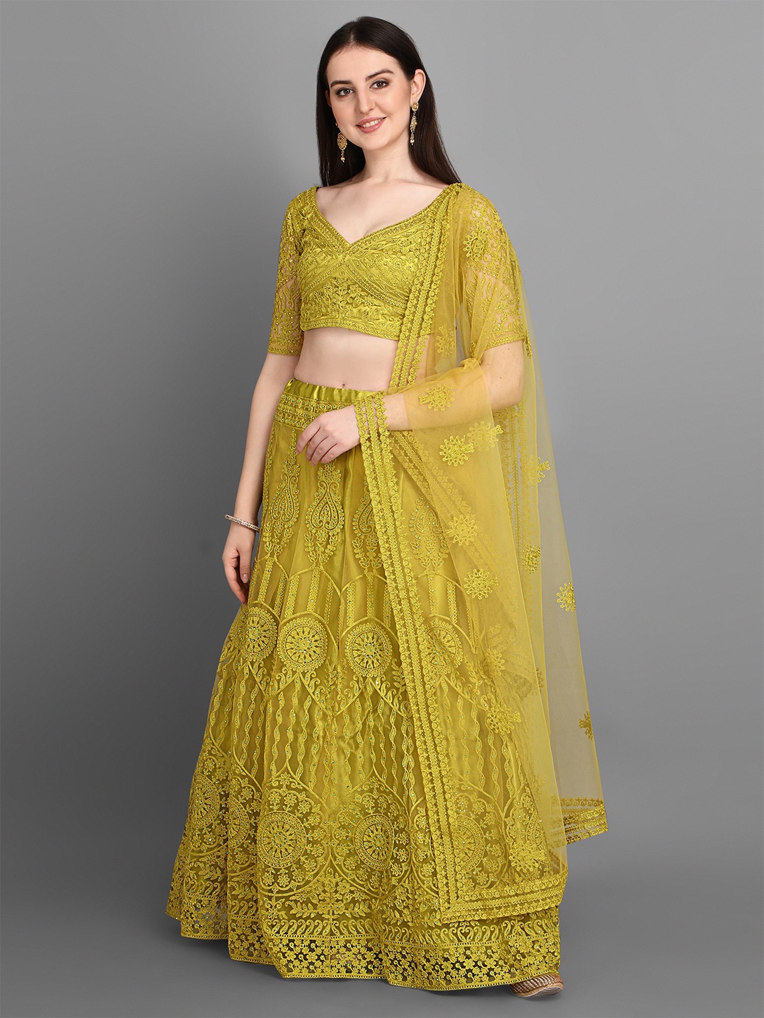 

Bollyclues Mustard Embroidered Thread Work Semi-Stitched Lehenga & Unstitched Blouse With Dupatta