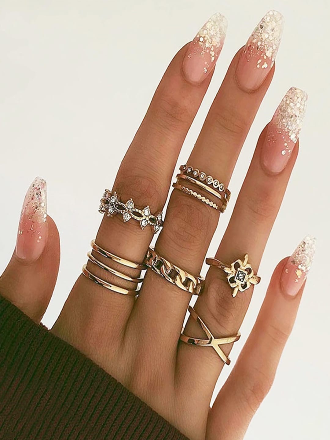 

Shining Diva Fashion Set Of 8 Gold-Plated White Crystal-Studded Finger Ring