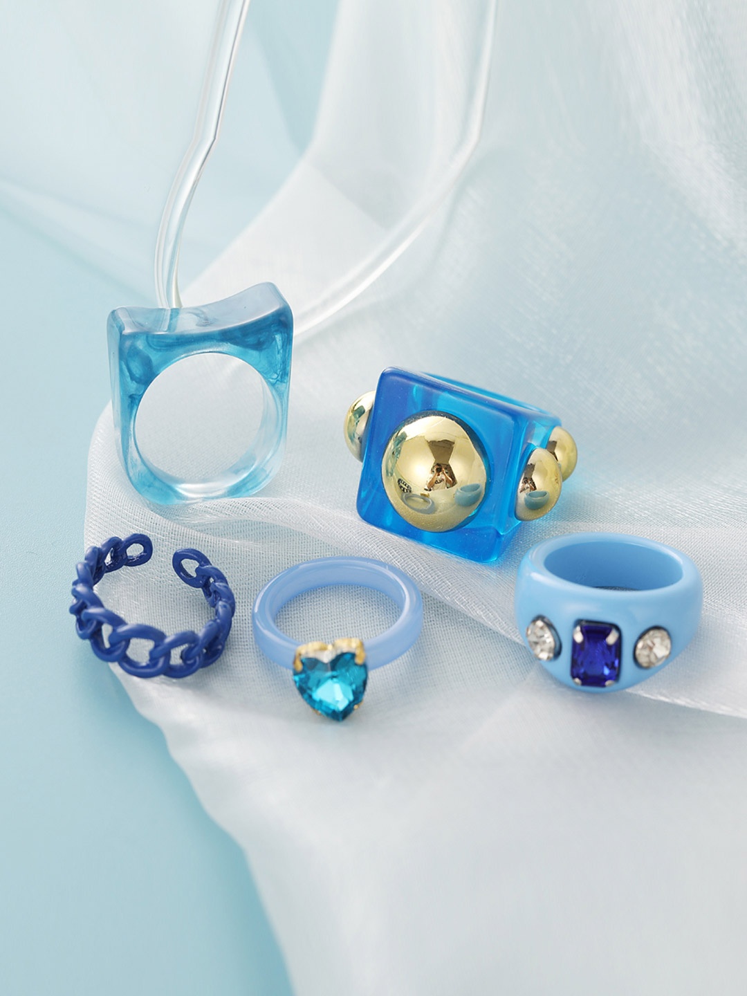 

Shining Diva Fashion Set Of 5 Gold-Plated Blue Crystal Studded Finger Rings