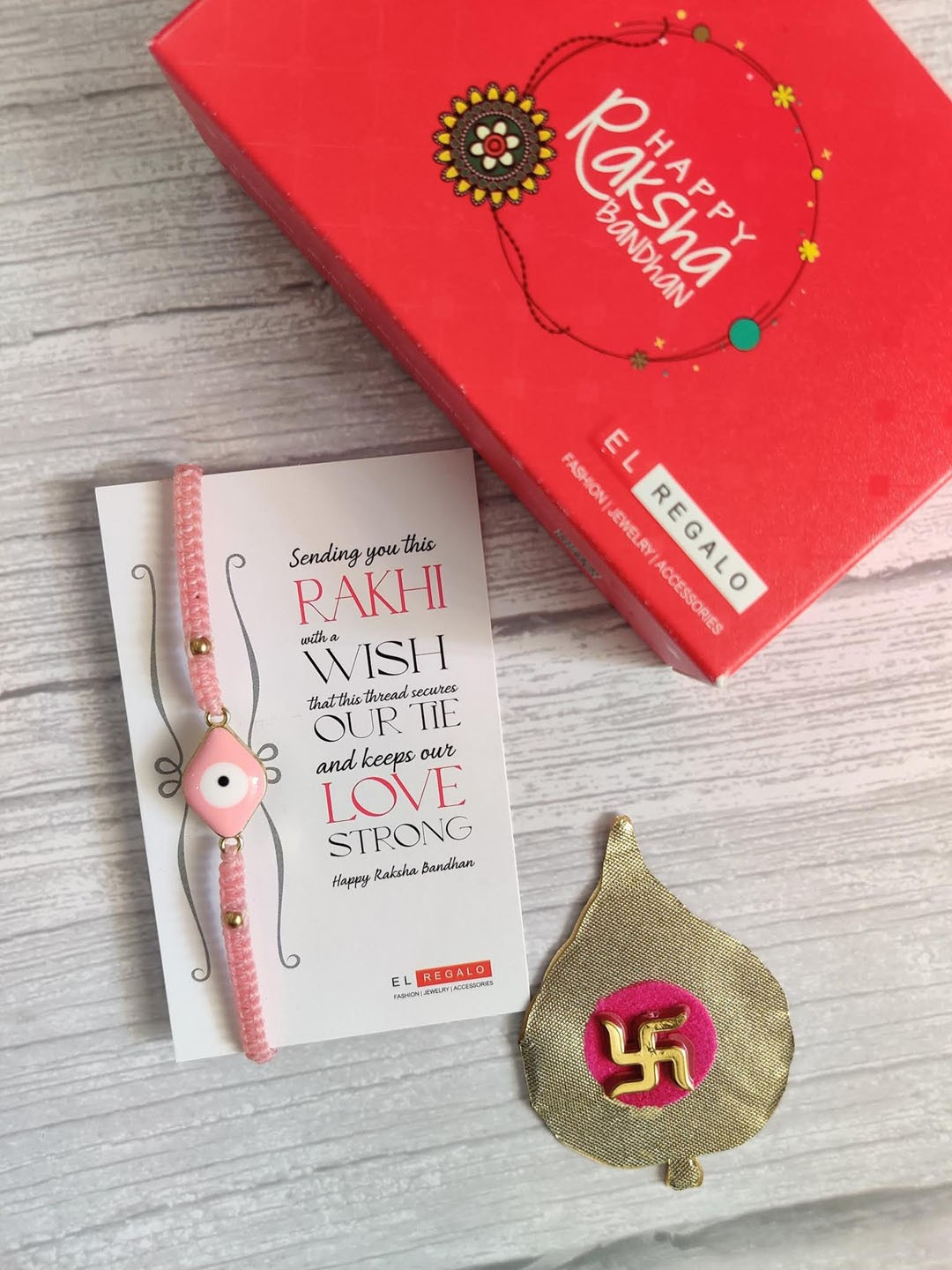 

EL REGALO Bracelet Rakhi Combo for Bhaiya With Roli Chawal Shagun and Greeting Card, Pink