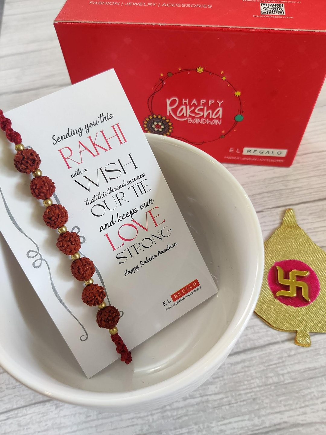 

EL REGALO Rudraksha Rakhi Combo for Bhai With Roli Chawal Shagun and Greeting Card, Multi