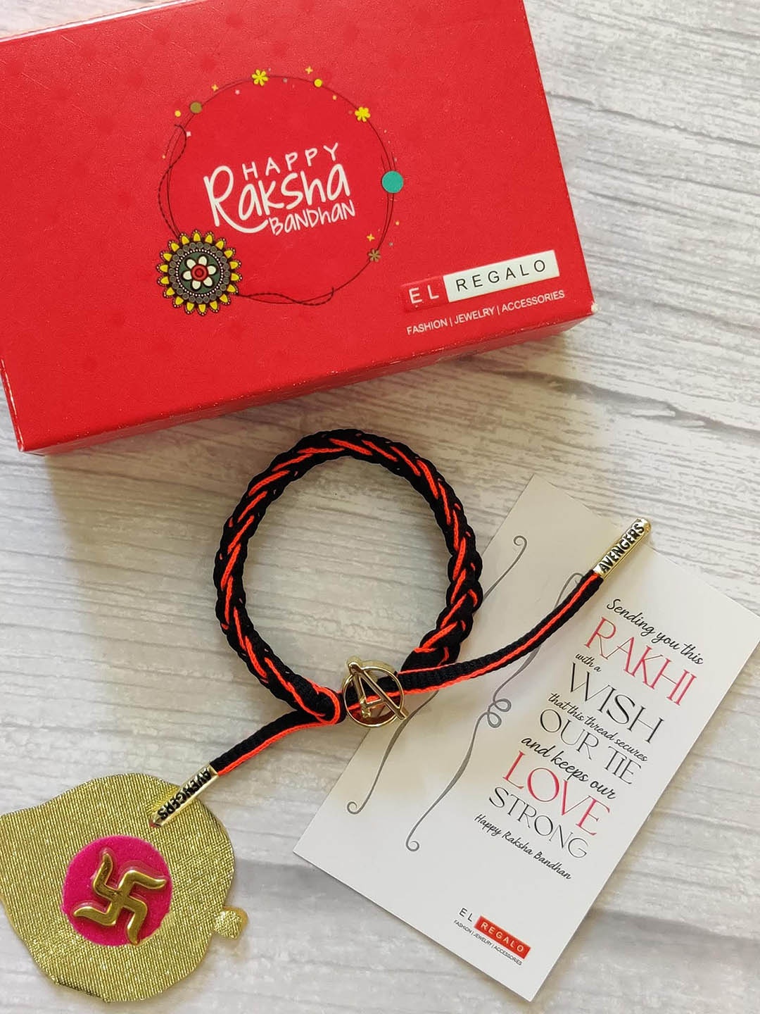 

EL REGALO Kids Rakhi Combo for Bhai With Roli Chawal Shagun and Rakhi Greeting Card, Maroon