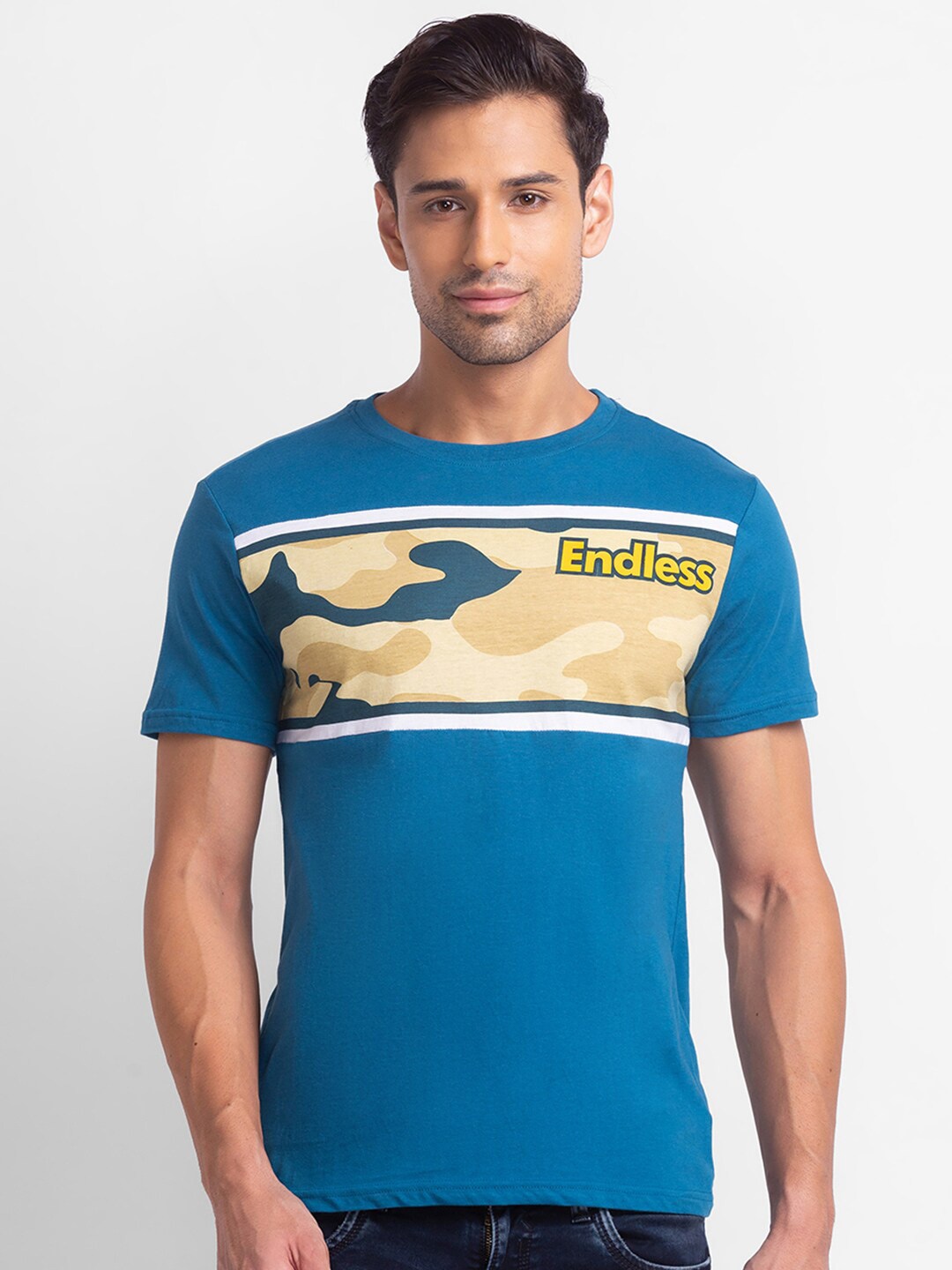 

Globus Men Teal & star command blue Printed Slim Fit T-shirt