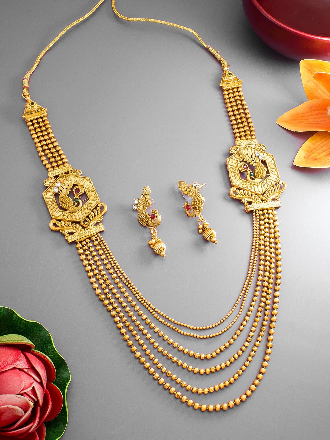 

aadita Gold-Plated Red & Green Stone Studded Long Jewellery Set