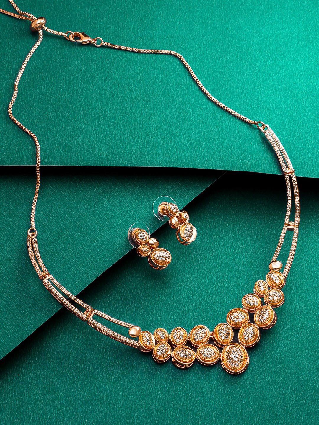 

aadita Gold-Plated White AD Atudded Jewellery Set