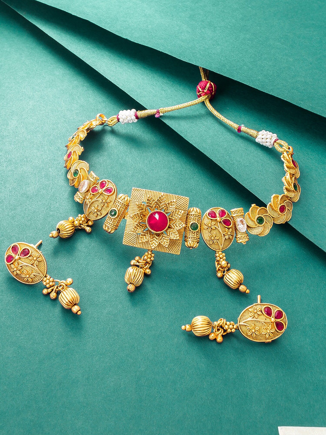 

aadita Gold-Plated Stone-Studded Jewellery Set