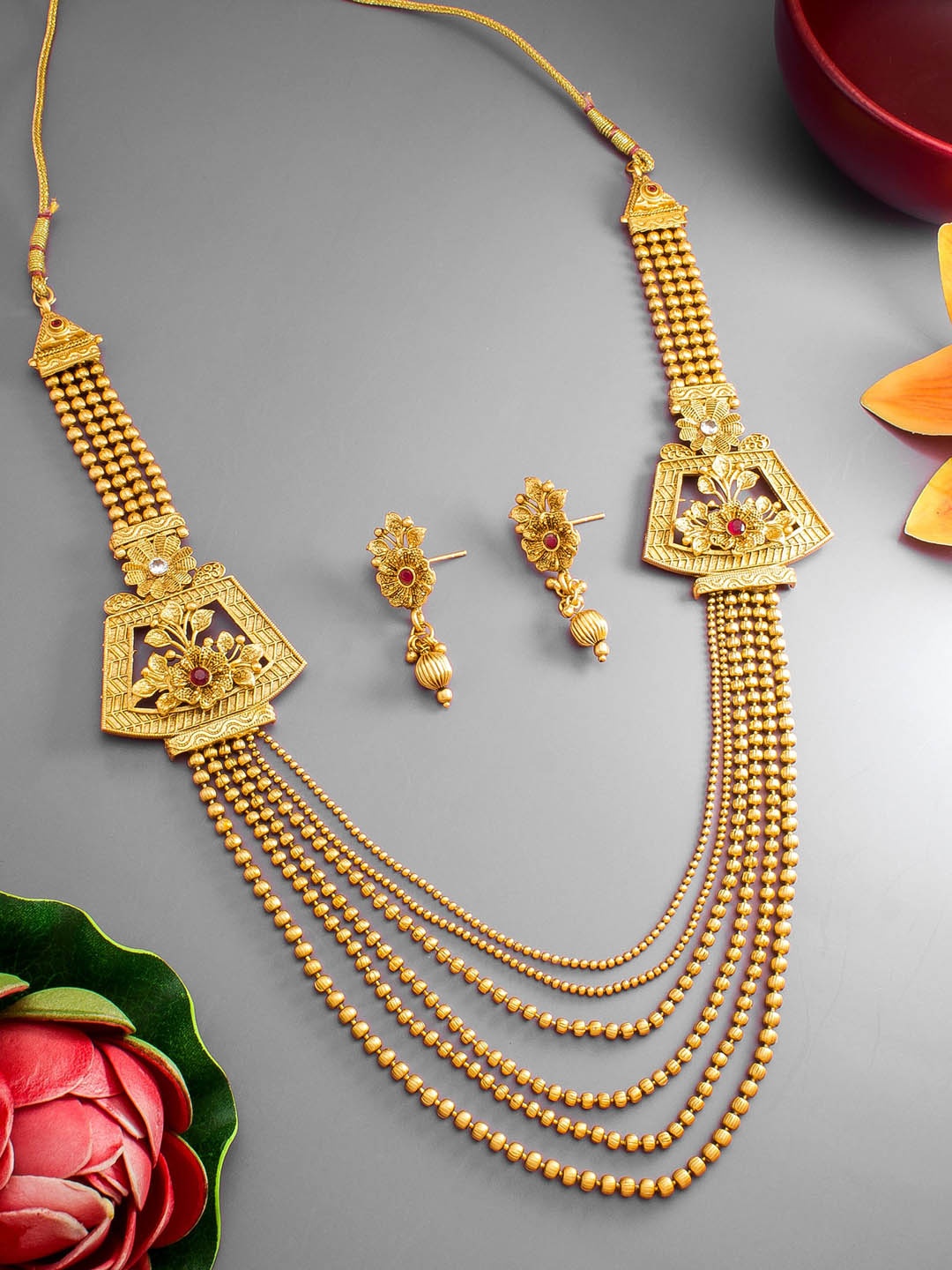 

aadita Gold-Plated Stone-Studded Layered Jewellery Set