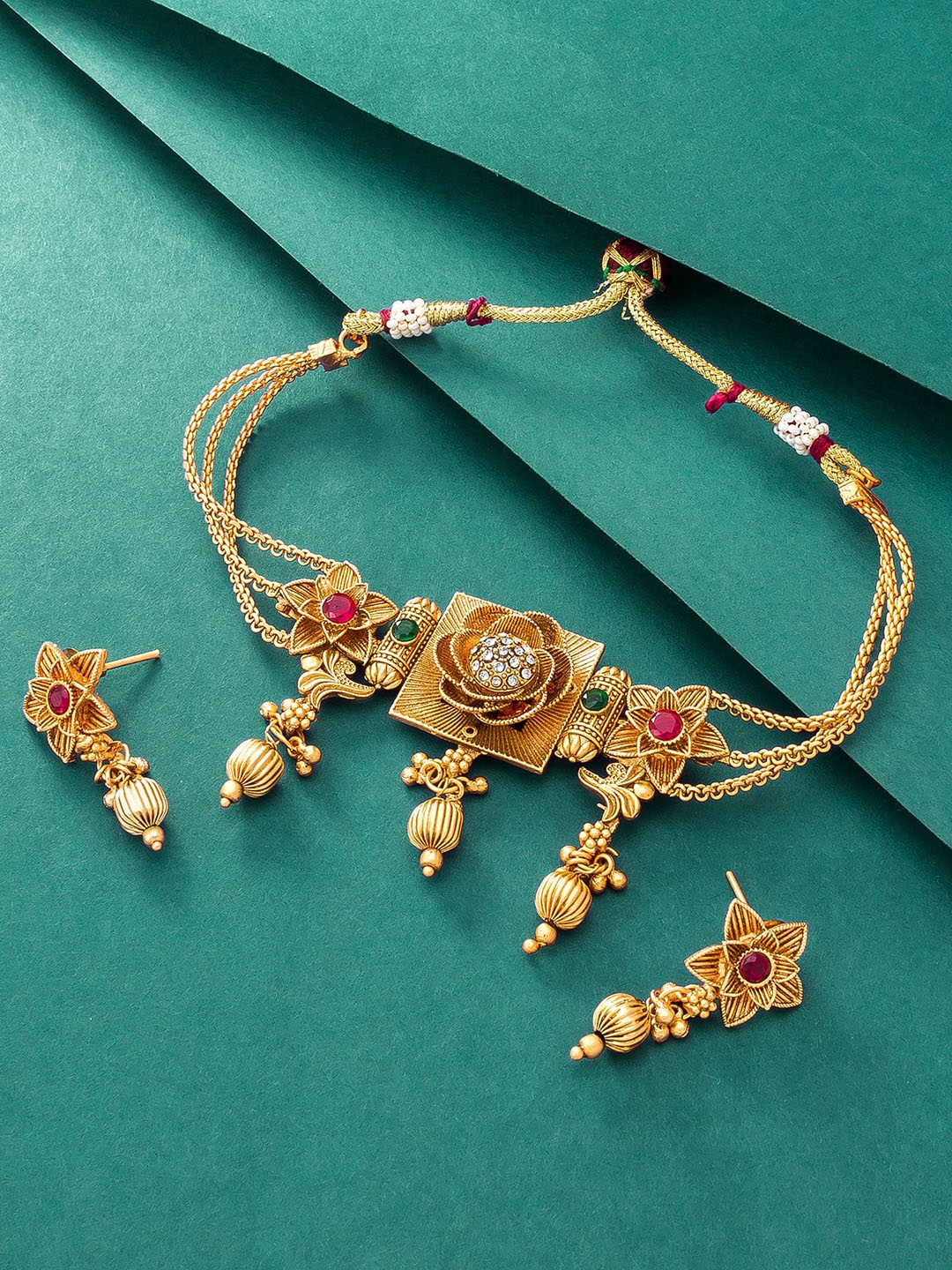 

aadita Gold Plated White Stone Studded Jewellery Set