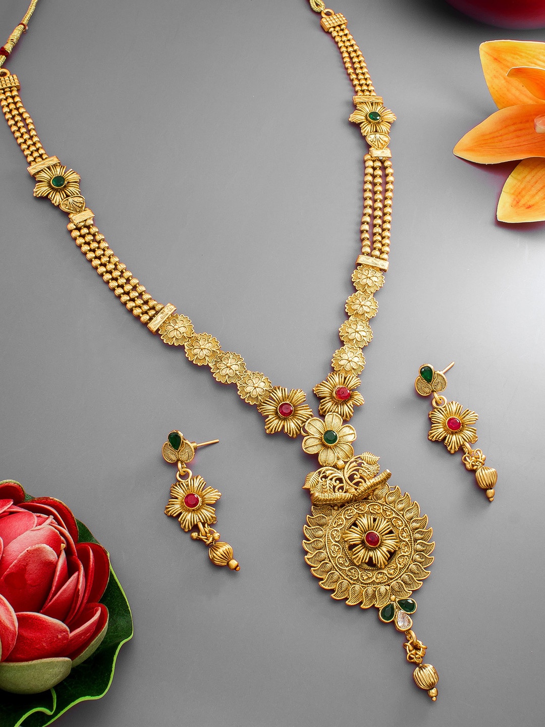 

aadita Gold-Plated Stone-Studded Jewellery Set