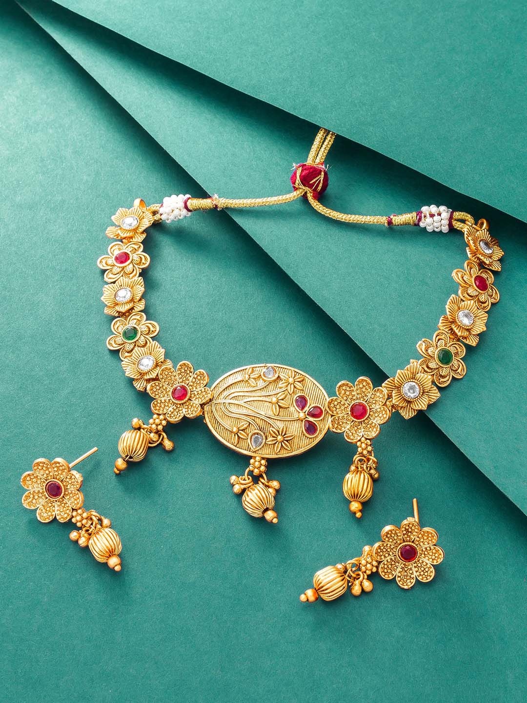 

aadita Gold-Plated Green & Red Stone-Studded & Beaded Jewellery Set