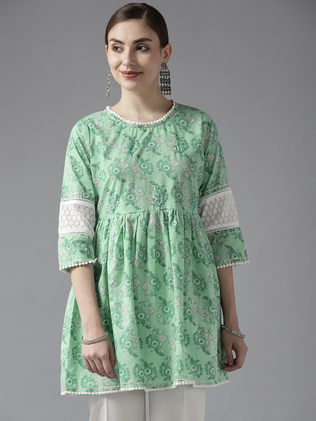 

Amirah s Green Ethnic Motifs Print Lace Inserts Pure Cotton A-Line Tunic