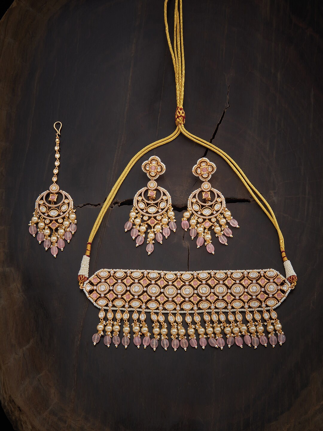 

Kushal's Fashion Jewellery Pink Kundan Studded Jewellery Set