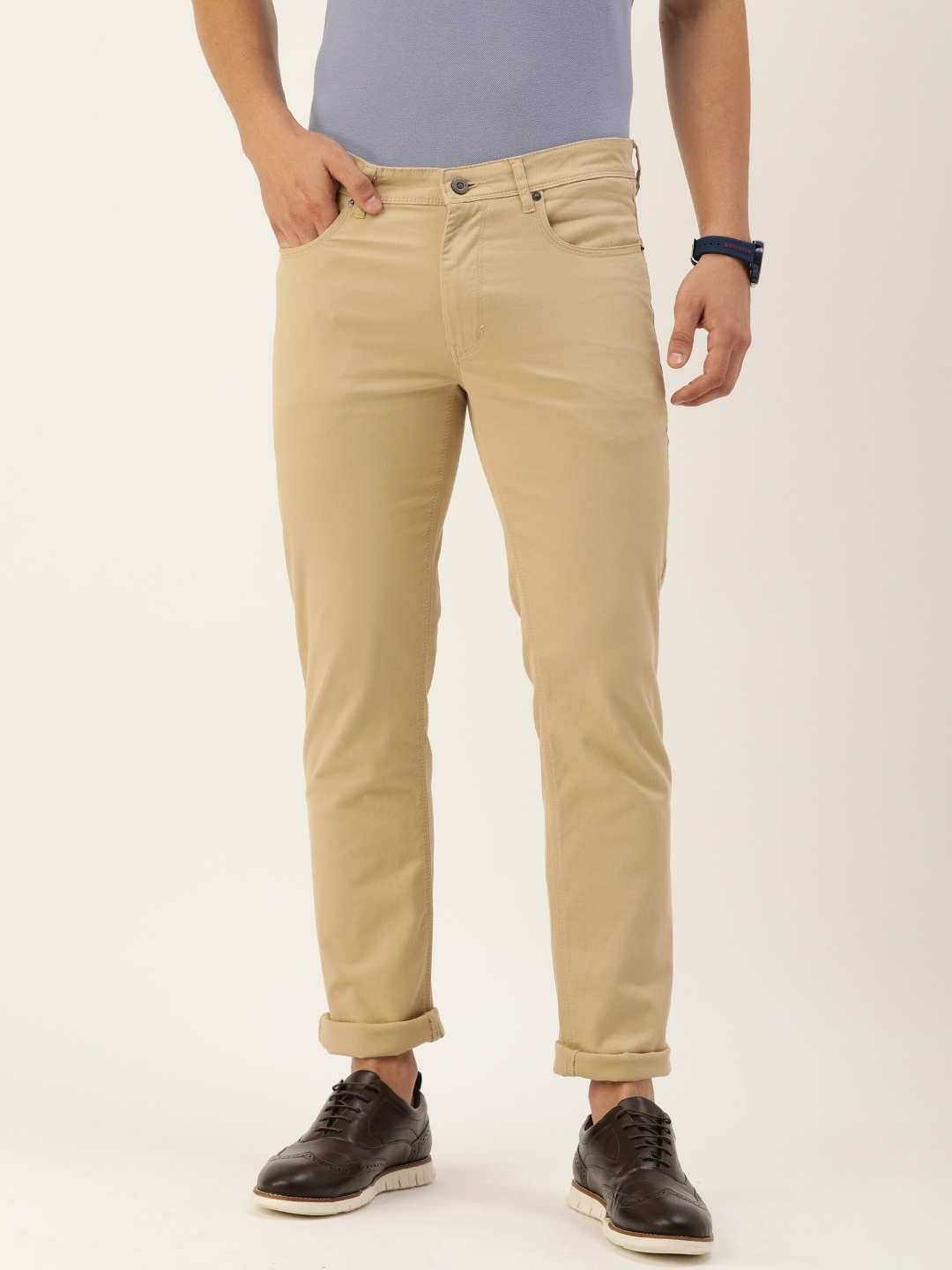 

Peter England Men Khaki Solid Mid Rise Slim Fit Casual Trousers