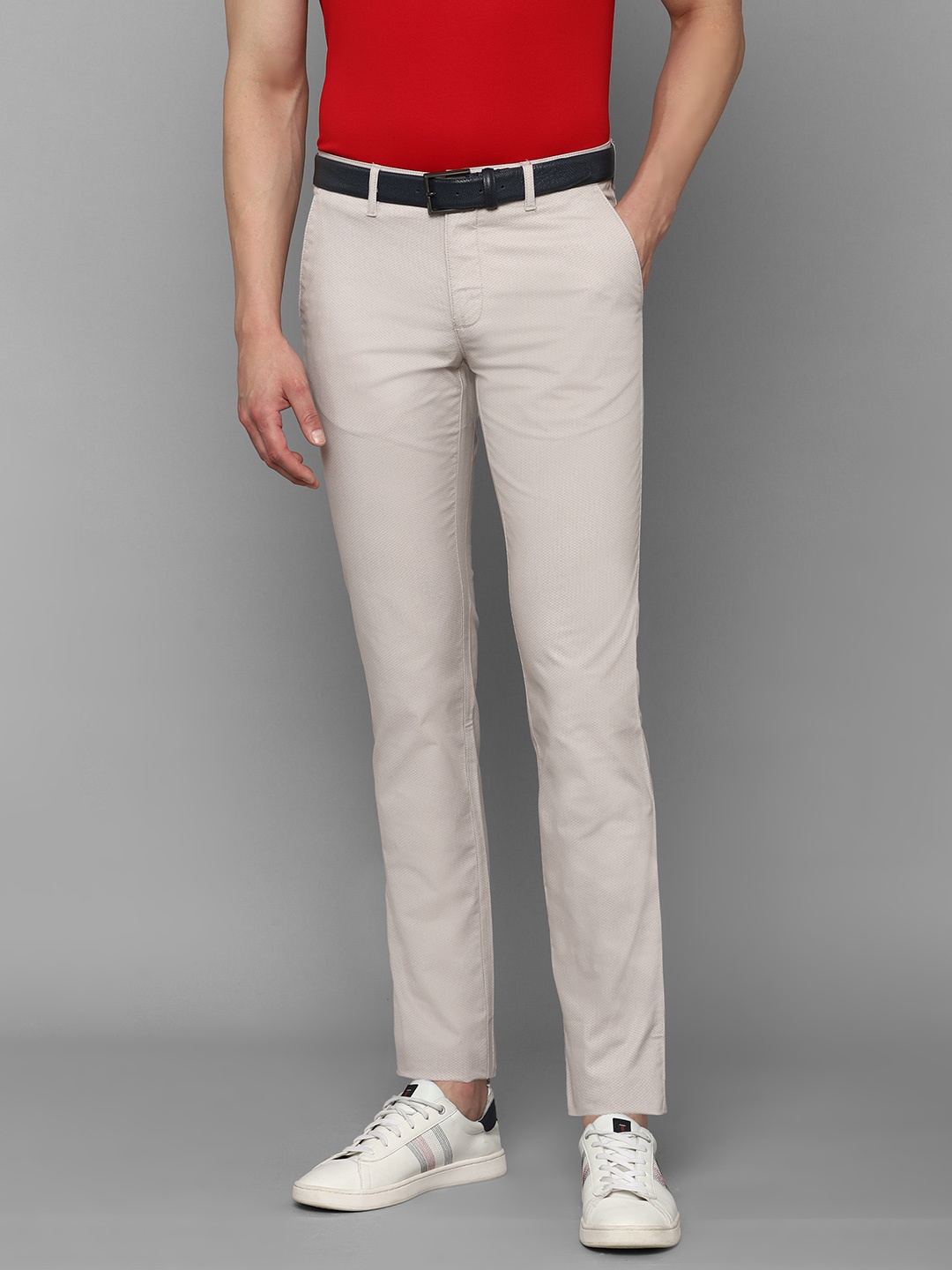 

Louis Philippe Sport Men Beige Textured Slim Fit Low-Rise Regular Trousers