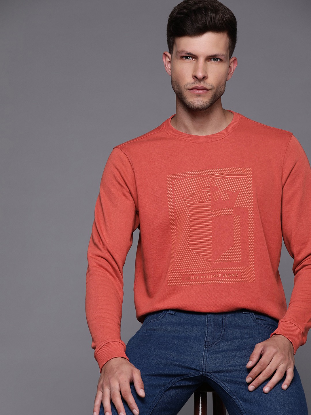

Louis Philippe Jeans Men Coral Red Embossed Print Sweatshirt