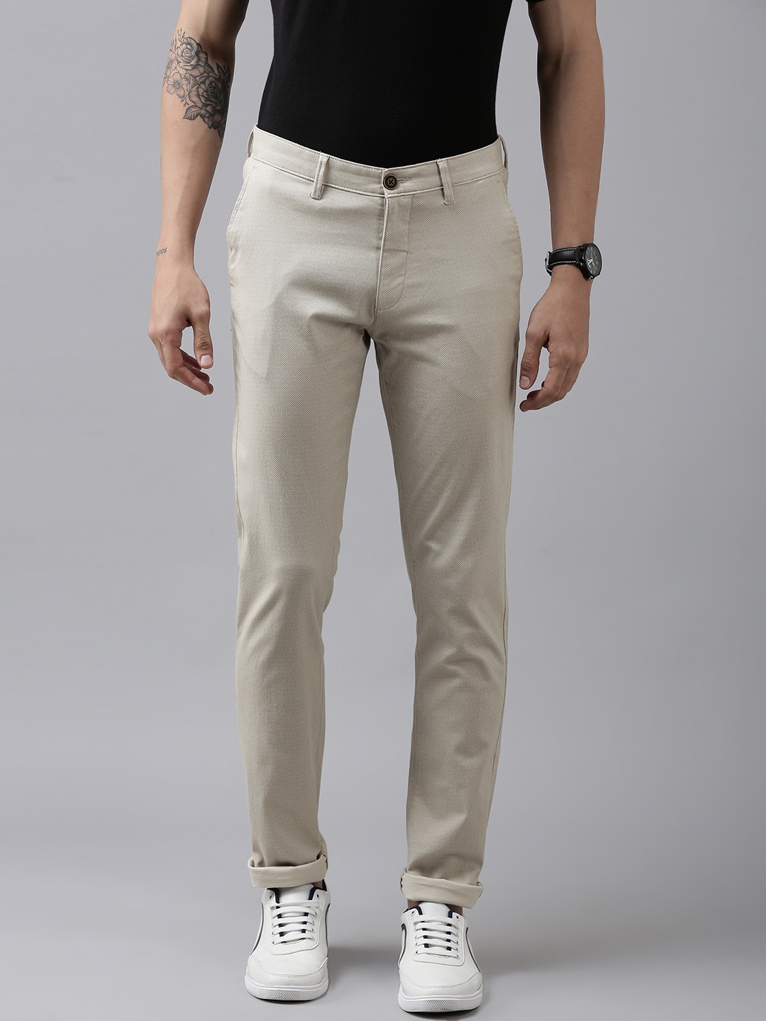 

Van Heusen Sport Men Cream-Coloured Geometric Print Tapered Fit Mid-Rise Plain Trousers