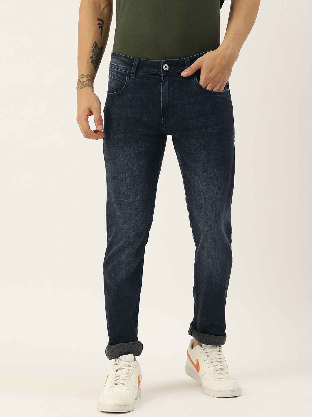 

Peter England Casuals Men Navy Blue Slim Tapered Fit Light Fade Stretchable Jeans