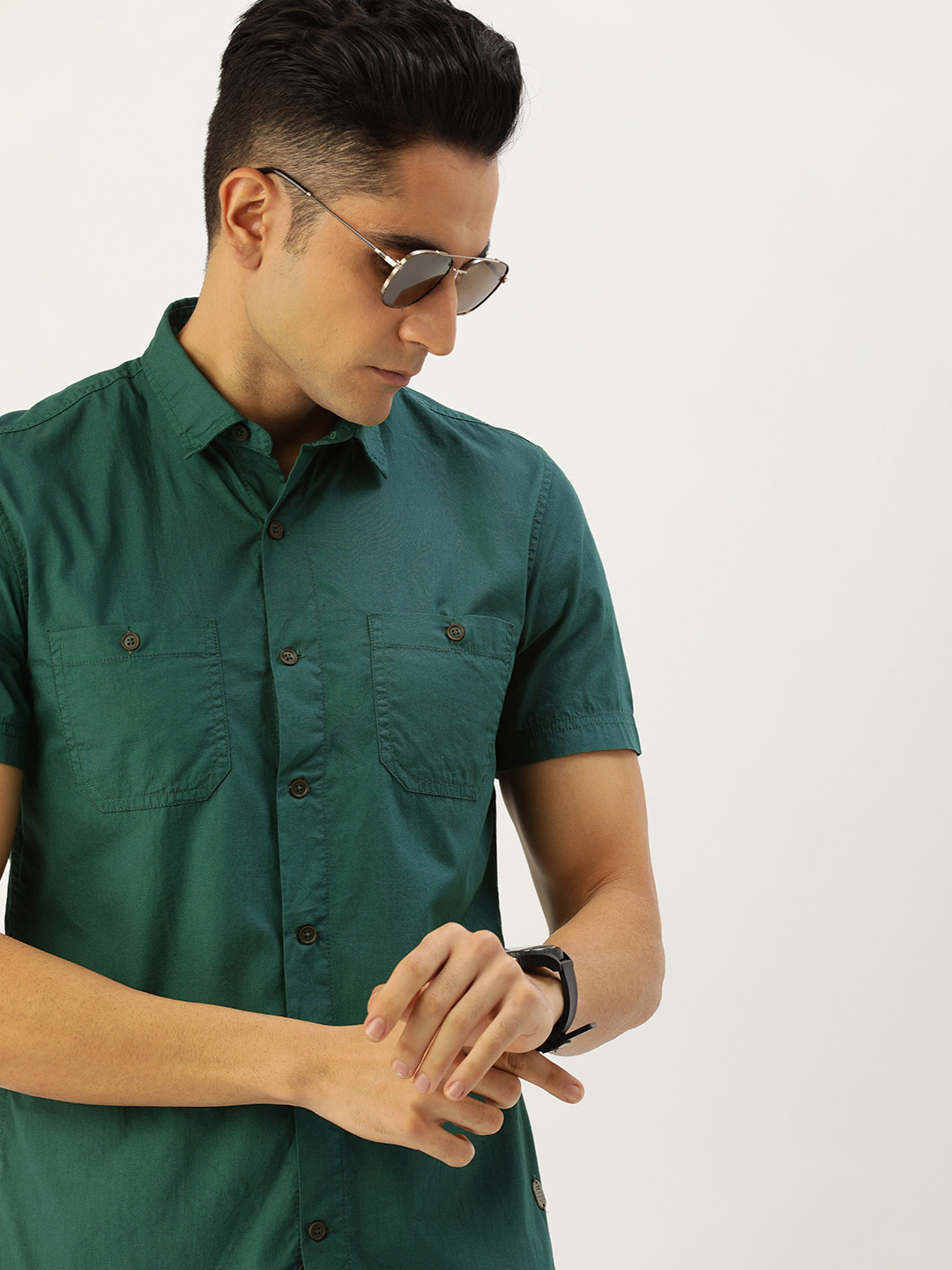 

Peter England Casuals Men Teal Green Super Slim Fit Casual Shirt