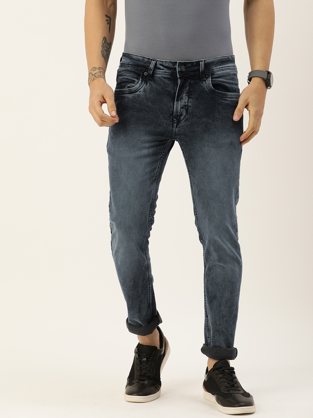 

Peter England Casuals Men Grey Slim Tapered Fit Light Fade Stretchable Jeans